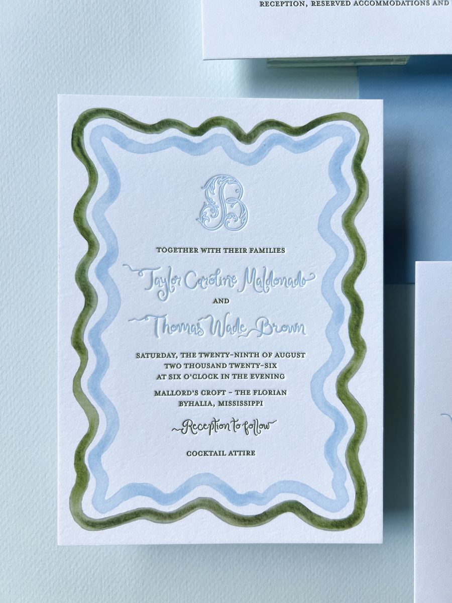 Letterpress wedding invitation suite with a wavy blue and green scalloped border and a monogram, image 1 of 17