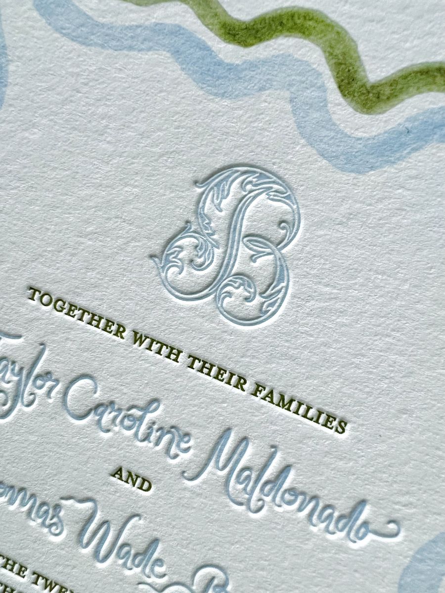 Letterpress wedding invitation suite with a wavy blue and green scalloped border and a monogram, image 4 of 17